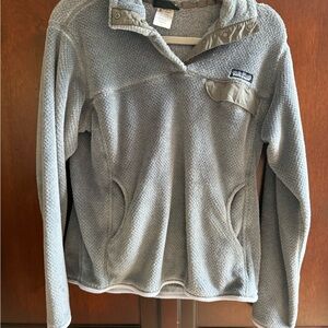 Patagonia Women's Light blue gray pullover -flaw on sleeve